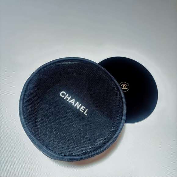 CHANEL Handbags - CHANEL round mesh cosmetic bag with mirror